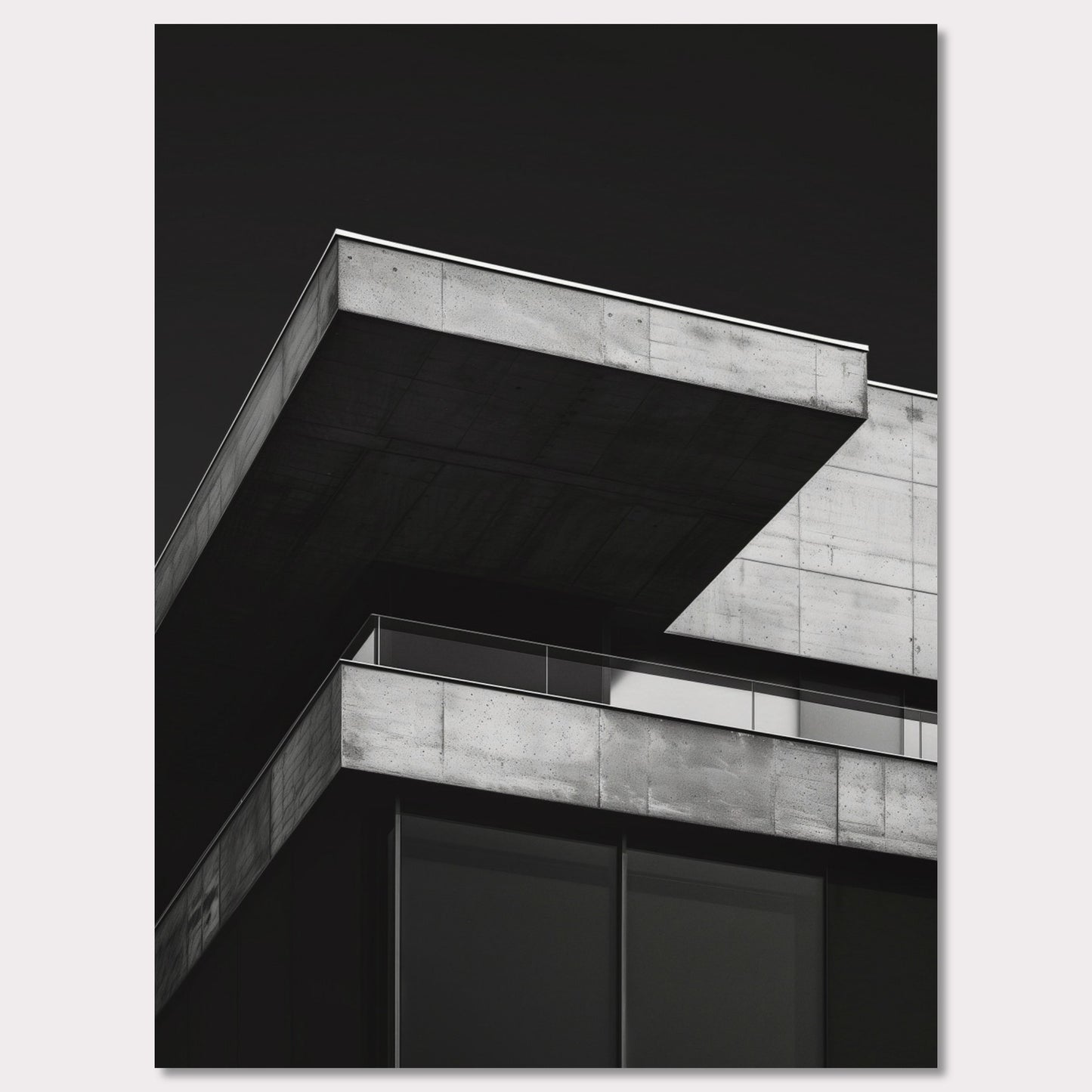 This striking black and white photograph captures the modern architectural lines of a concrete building against a dark background. The image highlights the stark contrast and geometric precision of contemporary design.