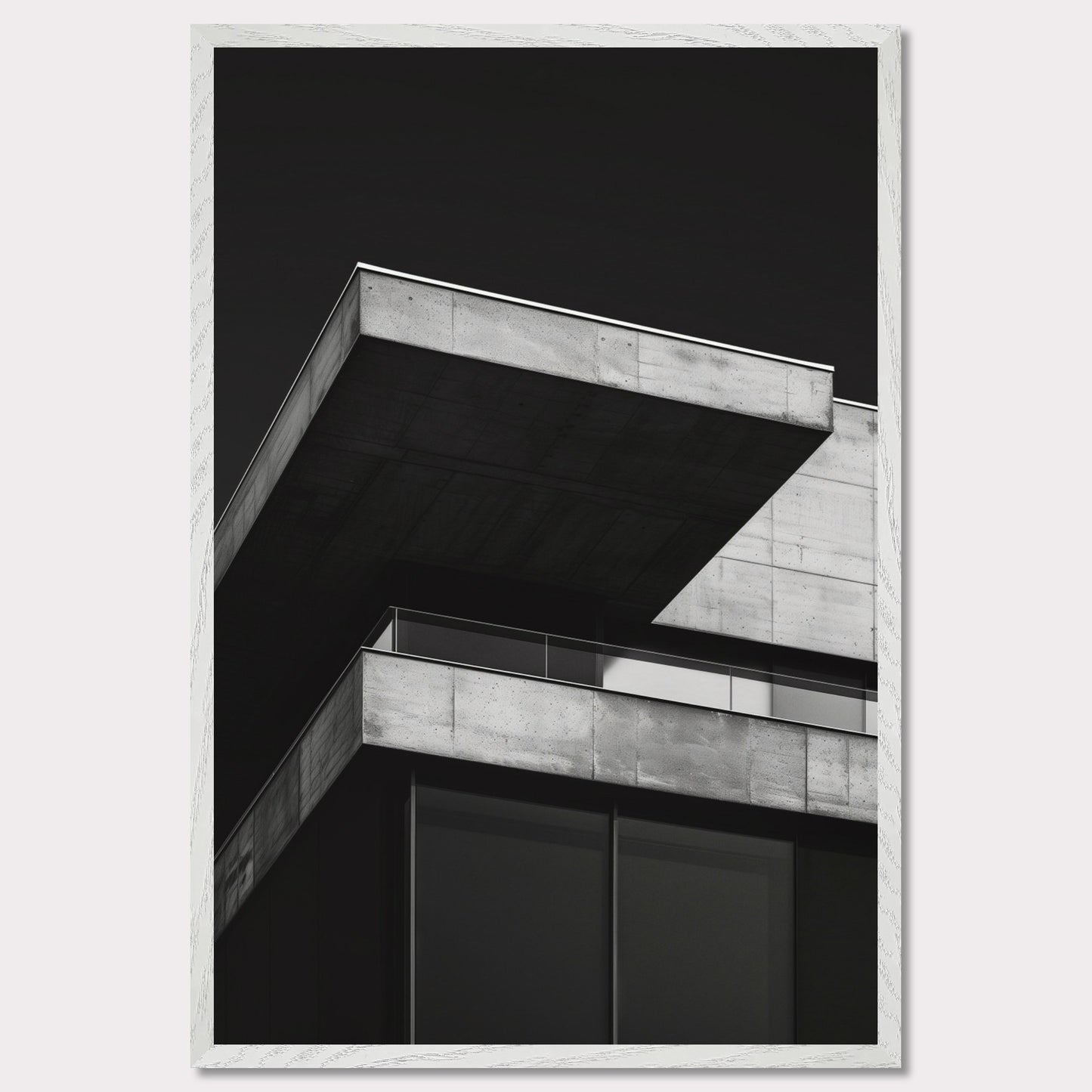 This striking black and white photograph captures the modern architectural lines of a concrete building against a dark background. The image highlights the stark contrast and geometric precision of contemporary design.