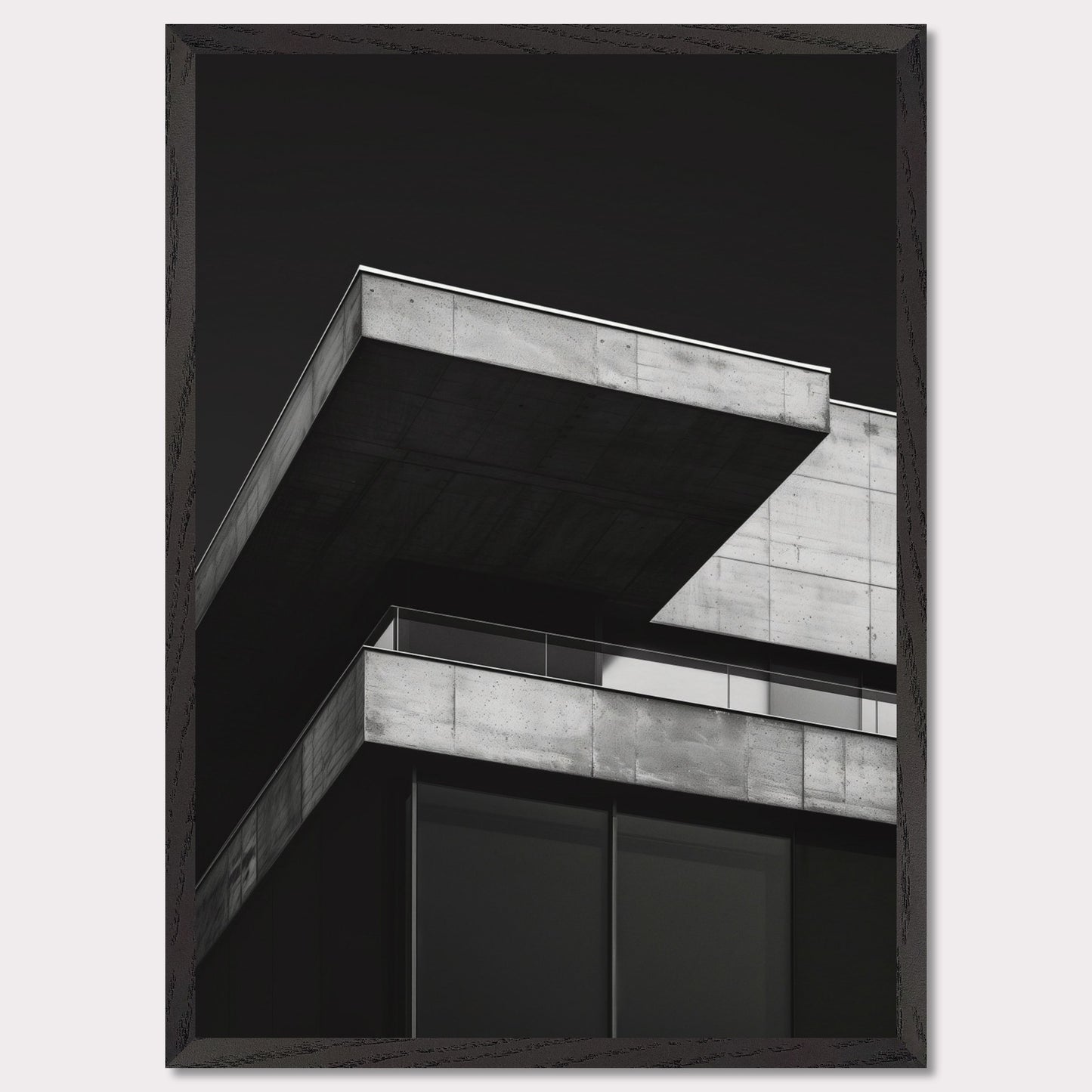 This striking black and white photograph captures the modern architectural lines of a concrete building against a dark background. The image highlights the stark contrast and geometric precision of contemporary design.