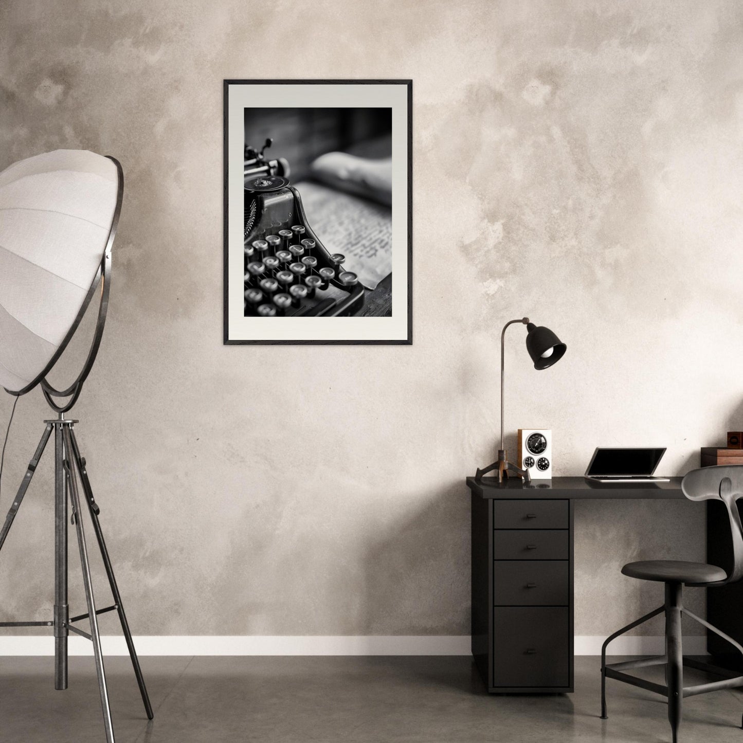 This is a black and white illustration of an old-fashioned typewriter with a blurred background.