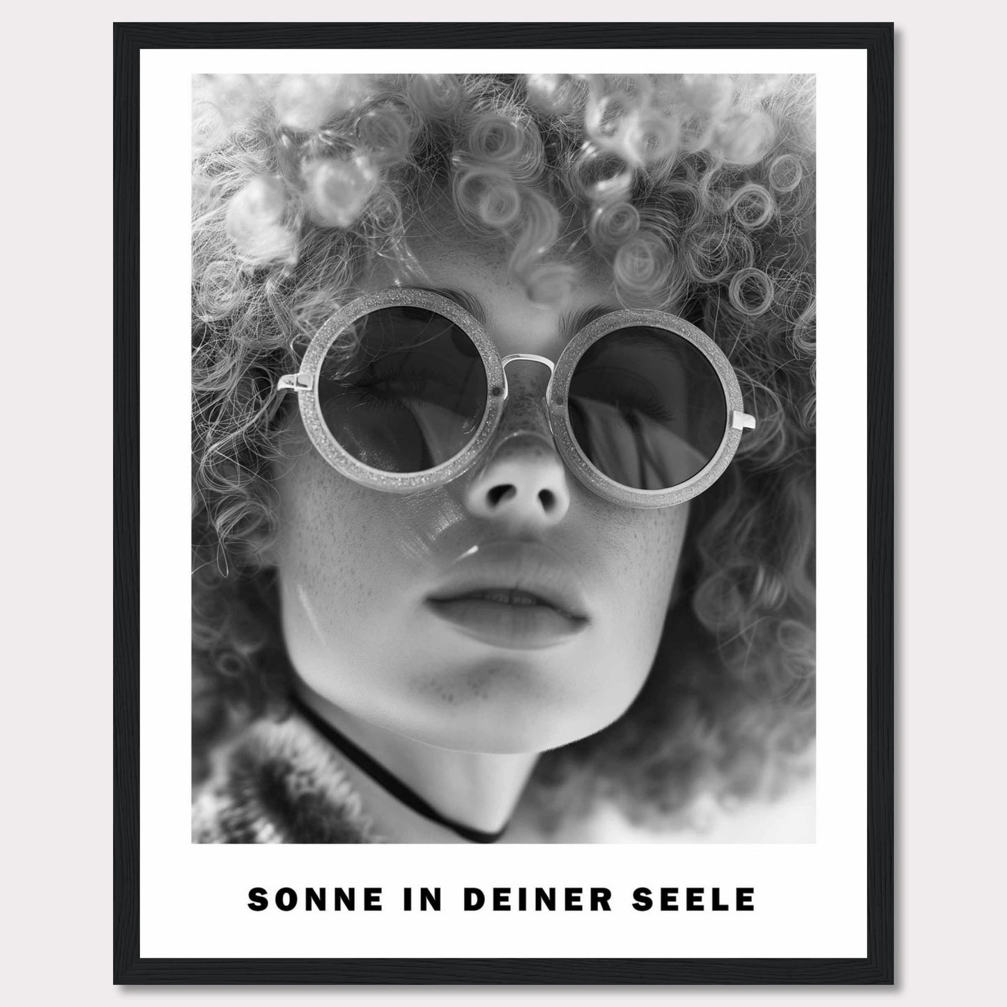 This black-and-white poster features a close-up of a person with curly hair wearing round sunglasses. The text at the bottom reads "SONNE IN DEINER SEELE," which translates to "Sun in Your Soul."