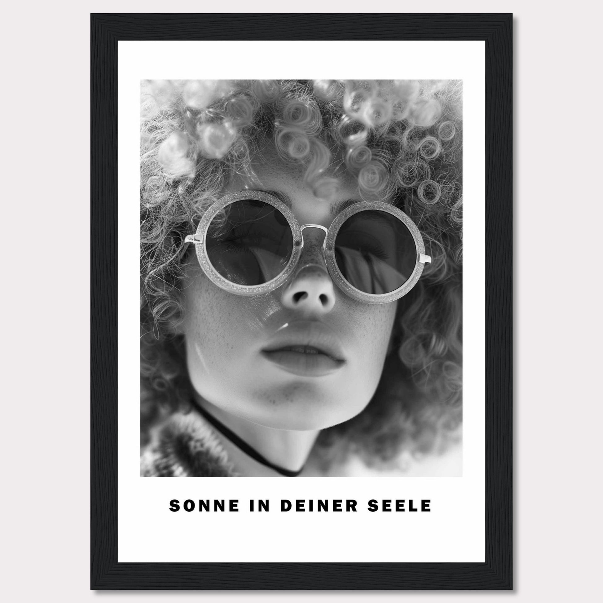 This black-and-white poster features a close-up of a person with curly hair wearing round sunglasses. The text at the bottom reads "SONNE IN DEINER SEELE," which translates to "Sun in Your Soul."