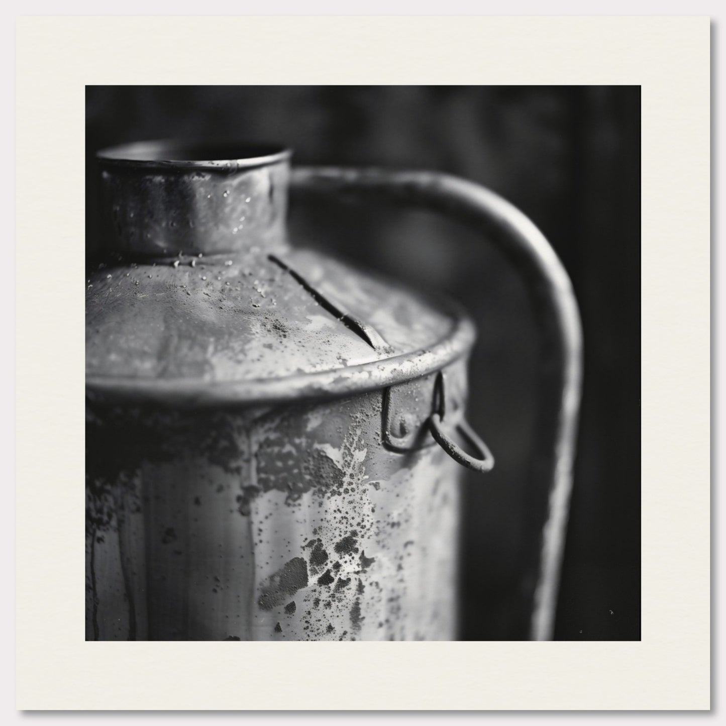 This illustration depicts a close-up view of an old, weathered metal container with a handle. The black and white composition highlights the texture and details of the rust and wear on the surface.