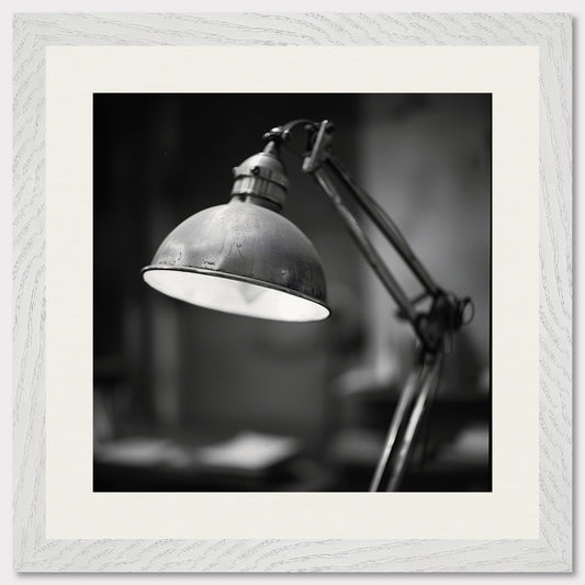 This illustration shows a black and white image of a vintage desk lamp with a metal shade.