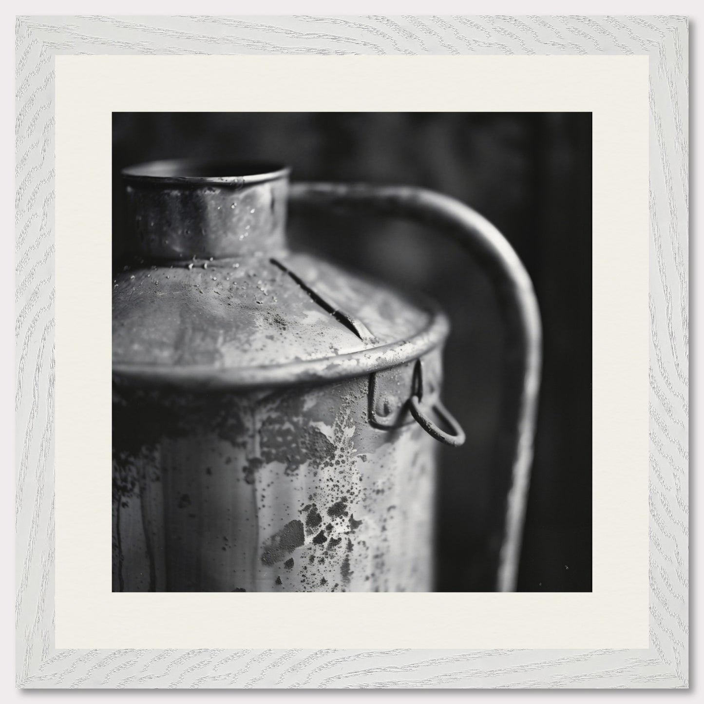 This illustration depicts a close-up view of an old, weathered metal container with a handle. The black and white composition highlights the texture and details of the rust and wear on the surface.