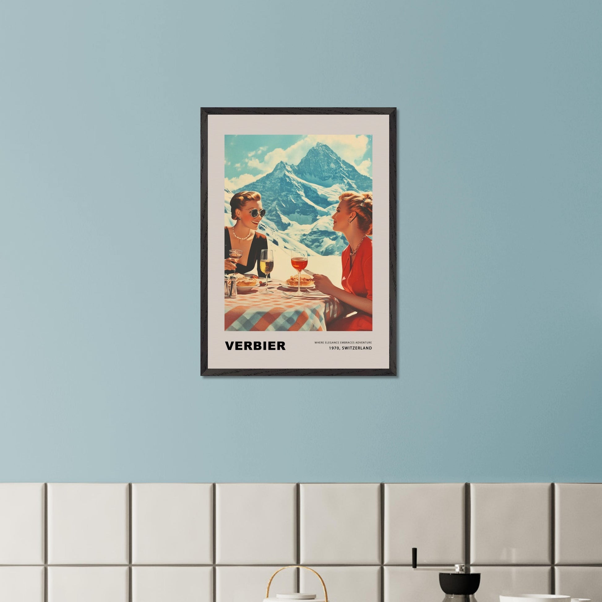 This glamorous poster showcases the refined charm of Verbier, featuring two elegantly dressed women enjoying an alfresco meal with breathtaking alpine peaks as their backdrop. The scene embodies a perfect blend of sophistication and adventure, inviting viewers to savor the unique allure of this Swiss ski destination.